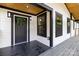 Inviting porch with stylish black trim, wood ceiling, and modern lighting fixtures at 1812 Lot 2 Anderson St, Charlotte, NC 28205