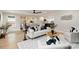 Open living space with contemporary furnishings and hardwood flooring flows into the kitchen and dining areas at 1812 Lot 2 Anderson St, Charlotte, NC 28205