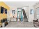 Spacious living room showcasing an open floor plan, a staircase, and inviting interior design at 1821 Ethel Guest Ln, Charlotte, NC 28206