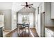 Bright dining area with white trim windows and a vaulted ceiling, adjacent to the kitchen at 2020 Makin Dr, Indian Trail, NC 28079