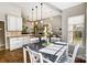 Bright dining area leads into an open-concept kitchen, creating a welcoming atmosphere at 2020 Makin Dr, Indian Trail, NC 28079