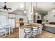 Eat-in kitchen offers bar seating, white cabinets, and granite countertops at 2020 Makin Dr, Indian Trail, NC 28079