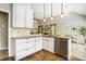 View of a kitchen with granite countertops, stainless steel appliances and white cabinets at 2020 Makin Dr, Indian Trail, NC 28079