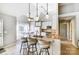 Open floor plan with kitchen island featuring bar stool seating and pendant lighting at 2020 Makin Dr, Indian Trail, NC 28079