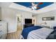 Stylish main bedroom with modern ceiling fan and connecting doors at 2020 Makin Dr, Indian Trail, NC 28079