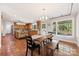 Open-concept kitchen with dining area, tile floors, and plenty of natural light at 21 Hollyberry Woods, Lake Wylie, SC 29710