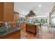Spacious kitchen features a professional range, custom cabinets, and views of the backyard at 21 Hollyberry Woods, Lake Wylie, SC 29710