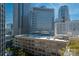 Picturesque city view showcasing a mix of modern skyscrapers and classic architecture on a sunny day at 210 N Church St # 1307, Charlotte, NC 28202