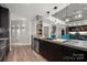 Modern kitchen featuring a concrete island, stainless steel appliances, and sleek cabinetry at 210 N Church St # 1307, Charlotte, NC 28202