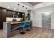 Stylish kitchen featuring modern fixtures, a concrete island, and stainless appliances at 210 N Church St # 1307, Charlotte, NC 28202