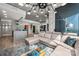 Open-concept living area with city views, a comfortable sofa, and access to kitchen at 210 N Church St # 1307, Charlotte, NC 28202