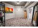 A cozy living room with a carpet and a large television at 210 N Church St # 1307, Charlotte, NC 28202