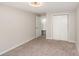 Neutral bedroom features plush carpet, closet and ceiling fan at 211 Heritage Blvd # 309, Fort Mill, SC 29715