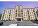 Beautiful condominium building featuring balconies, and a modern design, under a colorful, twilight sky at 211 Heritage Blvd # 309, Fort Mill, SC 29715