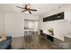 Well-lit living room features luxury vinyl plank flooring and a breakfast bar with bar stools at 211 Heritage Blvd # 309, Fort Mill, SC 29715