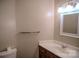 Clean bathroom with vanity, large mirror and good lighting at 2131 Wildlife Rd, Charlotte, NC 28214
