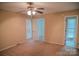 Spacious bedroom with carpet and large windows, providing lots of light at 2131 Wildlife Rd, Charlotte, NC 28214