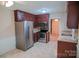 Cozy kitchen featuring modern stainless steel appliances and natural light at 2131 Wildlife Rd, Charlotte, NC 28214