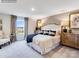 Inviting bedroom with a plush bed, elegant furnishings, and a bright window at 2165 Trollinger Dr, Catawba, NC 28609