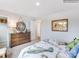Neutral bedroom featuring a modern dresser, decorative mirror, dinosaur accents, and ample space for comfort and style at 2165 Trollinger Dr, Catawba, NC 28609