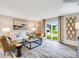 Cozy living room featuring modern furnishings and sliding glass doors leading to the backyard at 2165 Trollinger Dr, Catawba, NC 28609