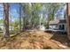 Beautiful backyard with a deck, gazebo, shed, and plenty of space for outdoor activities at 2439 Heathershire Ln, Matthews, NC 28105