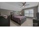 This bedroom has a modern design, plenty of natural light, and comfortable decor at 2439 Heathershire Ln, Matthews, NC 28105