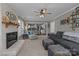 Spacious living room features a brick fireplace and an open floor plan at 2439 Heathershire Ln, Matthews, NC 28105
