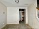 Dining room area showcasing bare floors and open access to the kitchen area at 2752 Bramble Ridge Ct, Charlotte, NC 28215