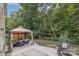 Inviting backyard featuring a gazebo with outdoor seating, perfect for relaxing and entertaining at 3009 Early Rise Ave, Indian Trail, NC 28079
