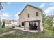 Rear exterior view of a two-story home with an outdoor gazebo on a concrete patio at 3009 Early Rise Ave, Indian Trail, NC 28079