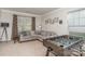 Recreational room with a foosball table, comfortable sofa, and ample natural light at 3009 Early Rise Ave, Indian Trail, NC 28079