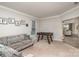 Cozy recreation room featuring a foosball table, sectional sofa, and lots of natural light at 3009 Early Rise Ave, Indian Trail, NC 28079