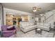 Bright living room featuring hardwood floors, an open layout, and a neutral color scheme at 3009 Early Rise Ave, Indian Trail, NC 28079