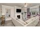 Comfortable living room featuring a fireplace, plush seating, and neutral color palette at 3009 Early Rise Ave, Indian Trail, NC 28079