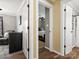 Hallway view showcasing the open flow and connectivity of rooms within the home at 3020 Salmon River Dr, Monroe, NC 28110