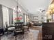 Bright, open living area with hardwood floors, vaulted ceilings and comfortable seating arrangement at 3020 Salmon River Dr, Monroe, NC 28110