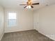 Bedroom with ceiling fan, a window and a closet at 326 Nantucket Way, Rock Hill, SC 29732