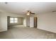 Spacious bedroom with plush carpet, a ceiling fan, and ample natural light at 326 Nantucket Way, Rock Hill, SC 29732