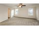 Bright bedroom with carpet flooring and two windows providing plenty of natural light at 326 Nantucket Way, Rock Hill, SC 29732