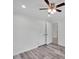Neutral bedroom featuring wood floors, ceiling fan and closet at 3452 Flat Creek Rd, Lancaster, SC 29720
