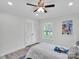 Cozy bedroom featuring wood-look flooring, a double door closet, and a serene view from the window at 3452 Flat Creek Rd, Lancaster, SC 29720
