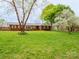 Charming brick ranch-style home with a well-manicured lawn and mature trees at 3452 Flat Creek Rd, Lancaster, SC 29720