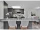 Stylish kitchen with granite countertops, stainless steel appliances, and a breakfast bar at 3452 Flat Creek Rd, Lancaster, SC 29720