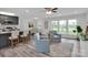 Bright open concept living space with modern furnishings, island, and a dining area at 3452 Flat Creek Rd, Lancaster, SC 29720