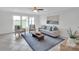 Light-filled living room with neutral tones, comfortable seating, and scenic views at 3452 Flat Creek Rd, Lancaster, SC 29720