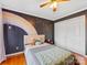 Charming bedroom featuring a rainbow decal, hardwood floors and ceiling fan with light at 3489 Lake Shore S Rd, Denver, NC 28037