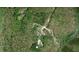 Aerial view of property with trees surrounding, road, houses and Hughs Creek at 368 Northwood Dr, Troy, NC 27371