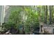 Exterior of a garden or greenhouse area with lush greenery at 368 Northwood Dr, Troy, NC 27371