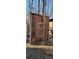 A rustic wooden structure with a 'Happy Place' sign at 368 Northwood Dr, Troy, NC 27371